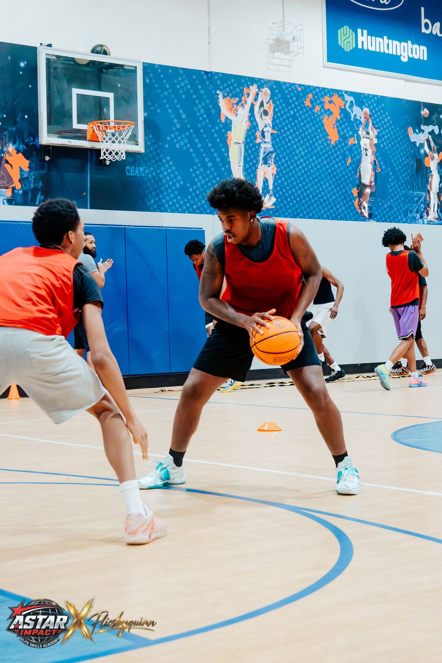An athlete driving past a defender