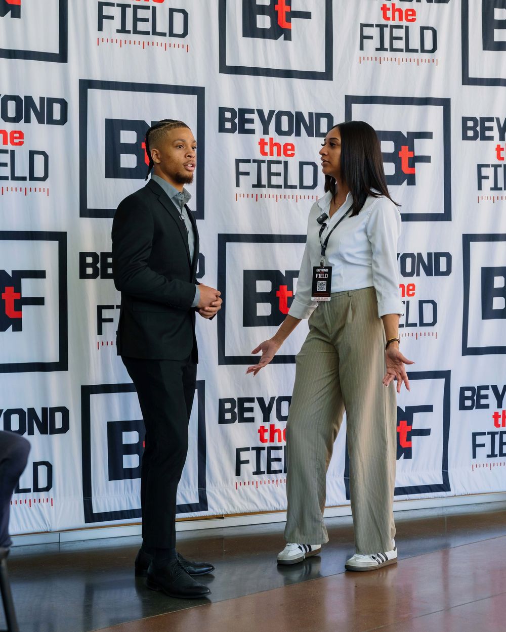 Two speakers at the Beyond the Field Player Development Summit
